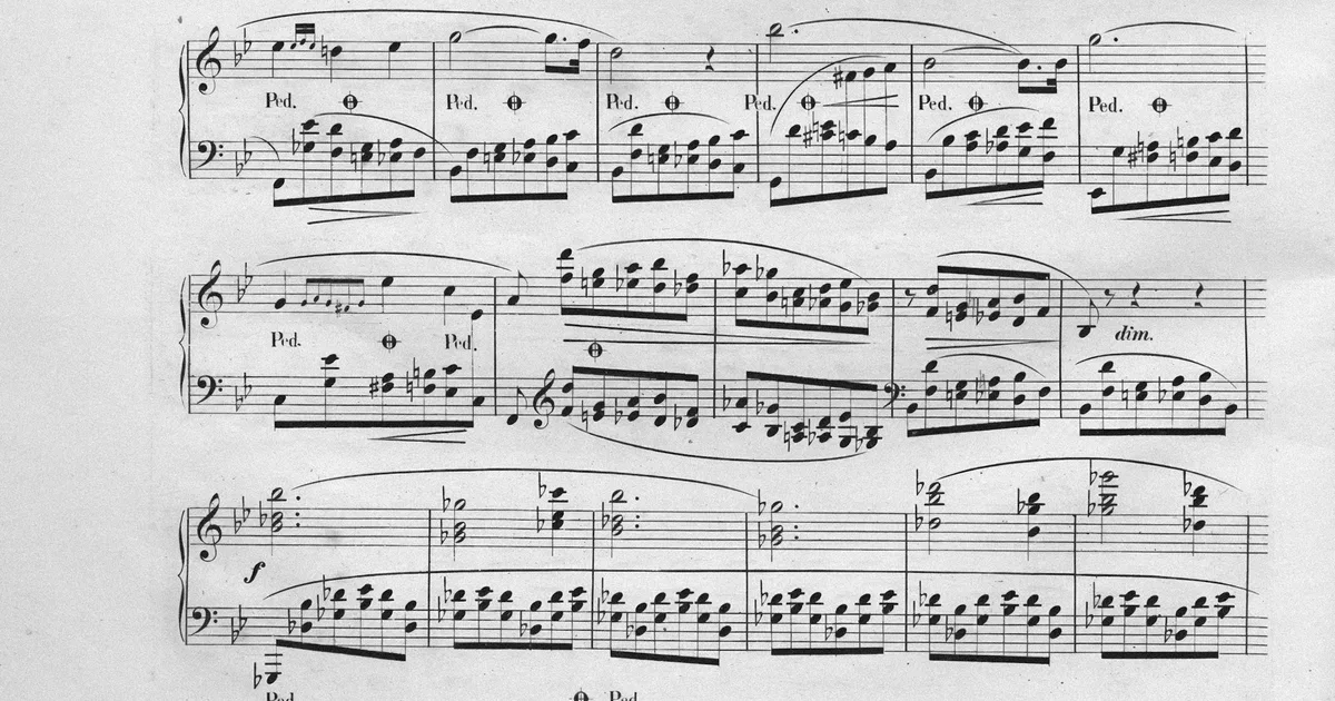 An open page of vintage piano sheet music with handwritten markings.